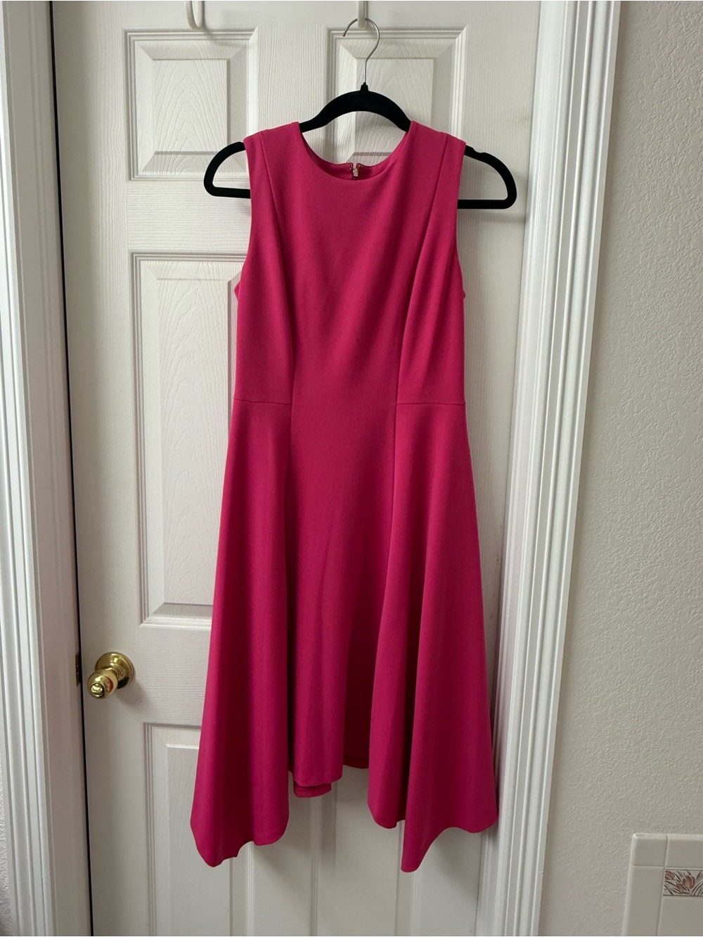 DKNY Sleeveless pink dress with flattering hankerchief cut skirt